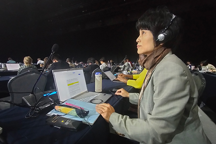 会員総会投票でのモーションの議論と投票の様子